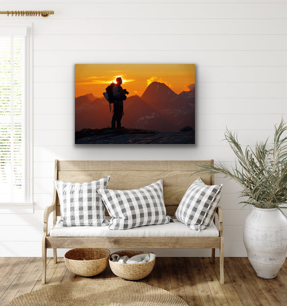 Mountain adventure photography canvas hangs in an entrance room. Artwork by Shel Neufeld, Canadian landscape and nature photographer. 