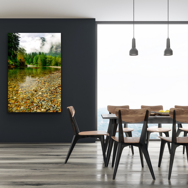 A photograph of Gold Creek in Golden Ears Provincial Park is captured and displayed as a large wall art in a dining room. Artwork by Shel Neufeld. 