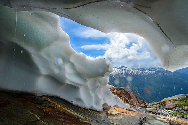 An ice cave in the mountains is photographed by Shel Neufeld. This was taken on his recent mountain adventures. 