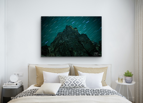 Mt Athelstan Night photography canvas by Shel Neufeld hangs in a bedroom lifestyle scene.
