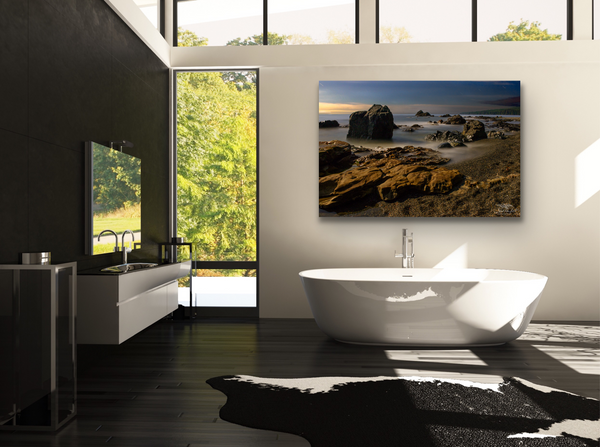 A beach landscape scene is captured by Shel Neufeld and printed into a canvas that measures 40x60. This canvas is hung in a bathroom scene. Available on different mediums and print sizes.