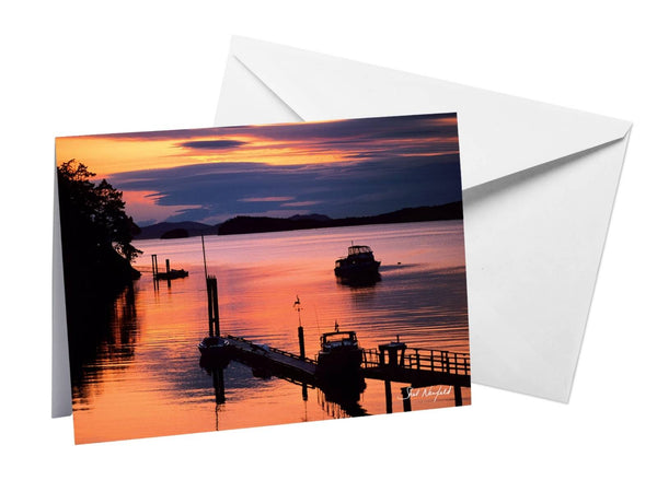 Pink and purple sunset over coastal landscape photography blank greeting card by Shel Neufeld. 