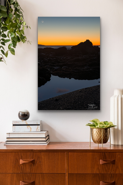 Vertical Sombrio Beach Sunset Canvas hangs in a living room. Artwork by Shel Neufeld. Available on canvas or luster photo paper, in a variety of sizes. 
