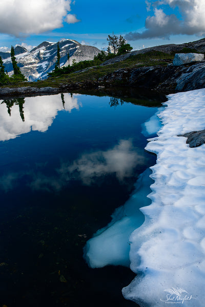 Snow melting into Tarn Mountain and Lake Vertical Landscape Photography Fine Art Print Home Decor, Wall Art by Shel Neufeld, Canadian Nature Photographer based out of Rock Creek