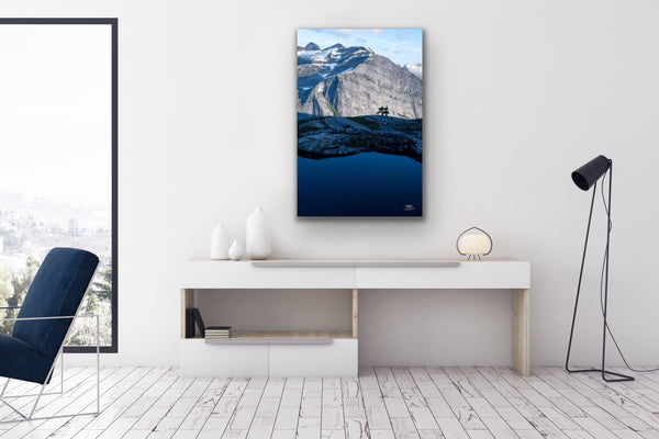 Vertical mountain landscape canvas hangs in a living room. Artwork by Shel Neufeld, Canadian landscape and nature photographer. 