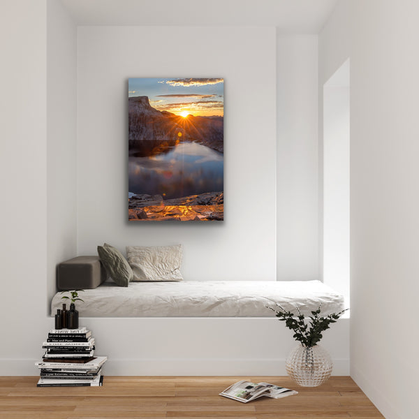 Mountain sunset vertical canvas wall art hangs in a living room. Artwork by Shel Neufeld, Canadian landscape and nature photographer. 