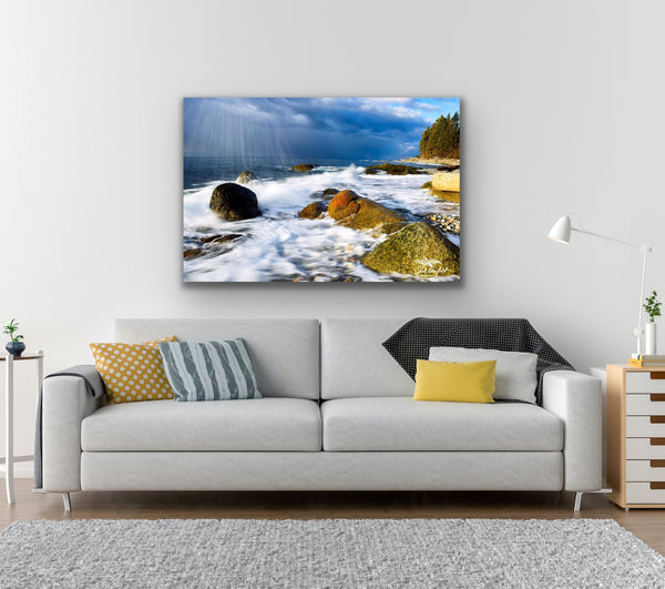 Blue Coastal landscape canvas hangs in a living room above a couch. Artwork by Shel Neufeld, Canadian landscape and nature photographer. 