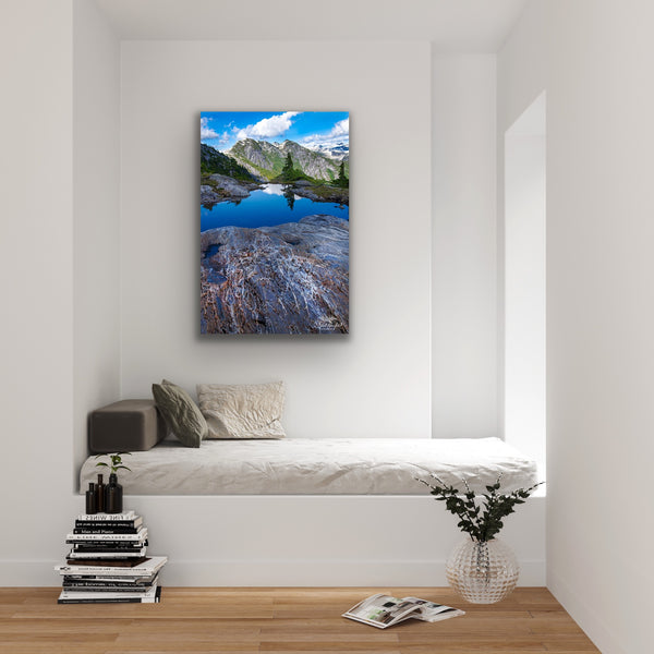 Vertical Mountain Photography Canvas hangs in a living room. Photography by Shel Neufeld, Canadian landscape and nature photographer. 