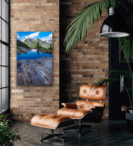 Vertical mountain landscape canvas hangs in a living room. Artwork by Shel Neufeld, Canadian landscape photographer. 